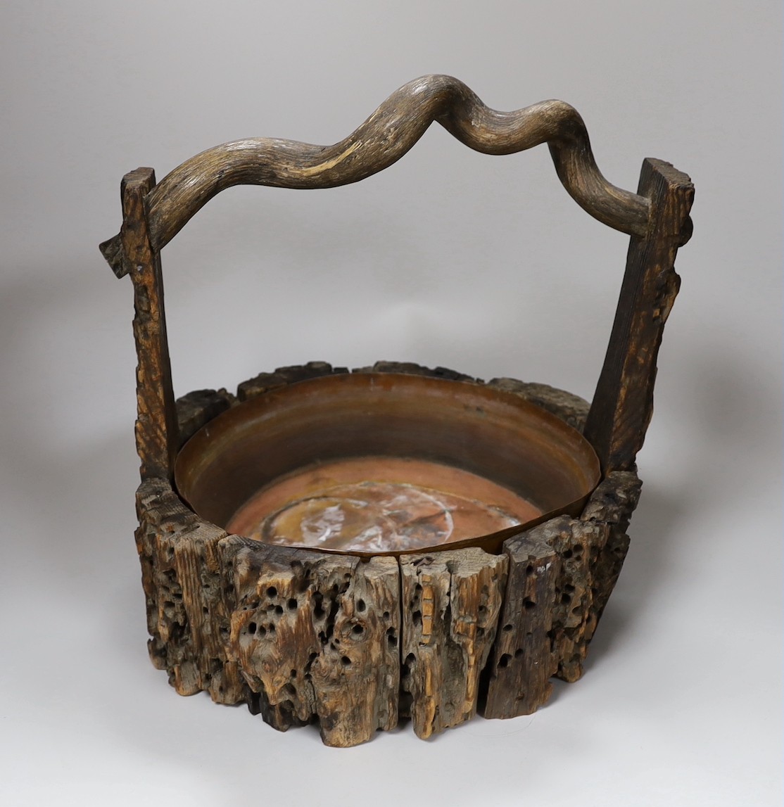 A Japanese Ikebana wood basket, together with a tall bamboo sectional Ikebana vase. Tallest 102cm